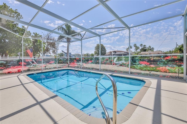outdoor pool featuring a patio