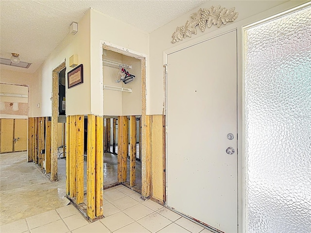 4420 Marine Pkwy, New Port Richey, FL 34652 - hall with a textured ceiling and wainscoting