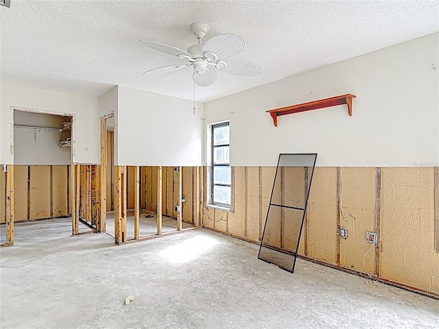4420 Marine Pkwy, New Port Richey, FL 34652 - misc room with ceiling fan and a textured ceiling