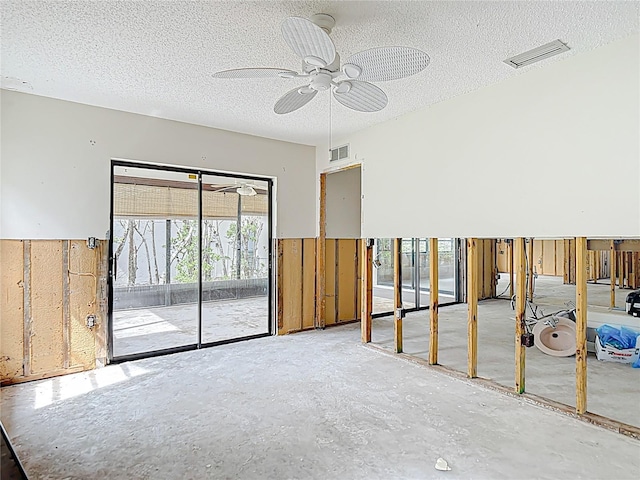 4420 Marine Pkwy, New Port Richey, FL 34652 - unfurnished room with a ceiling fan and a textured ceiling