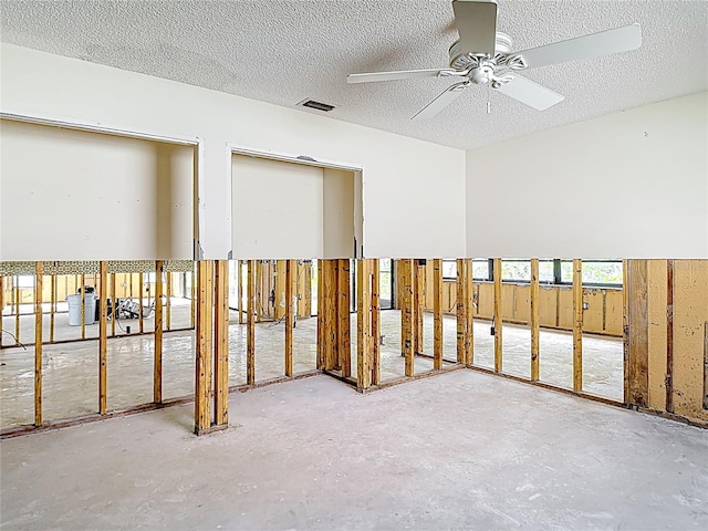 4420 Marine Pkwy, New Port Richey, FL 34652 - spare room with ceiling fan and a textured ceiling