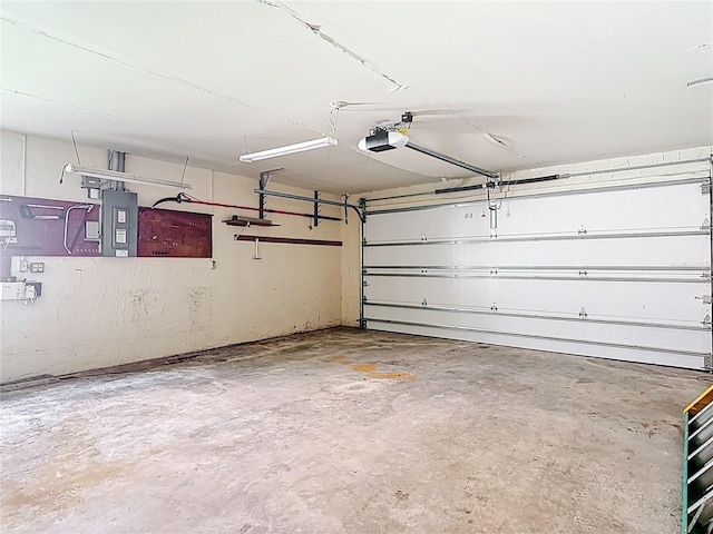 4420 Marine Pkwy, New Port Richey, FL 34652 - garage featuring a garage door opener and electric panel