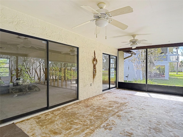 4420 Marine Pkwy, New Port Richey, FL 34652 - unfurnished sunroom featuring a ceiling fan and healthy amount of natural light