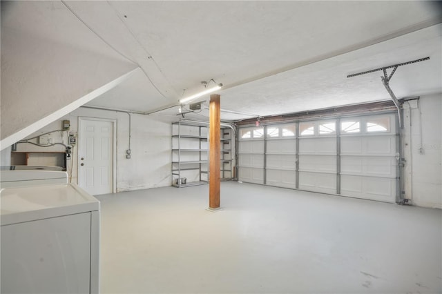 12106 Bear Creek Ln, Hudson, FL 34667 - garage featuring a garage door opener and independent washer and dryer