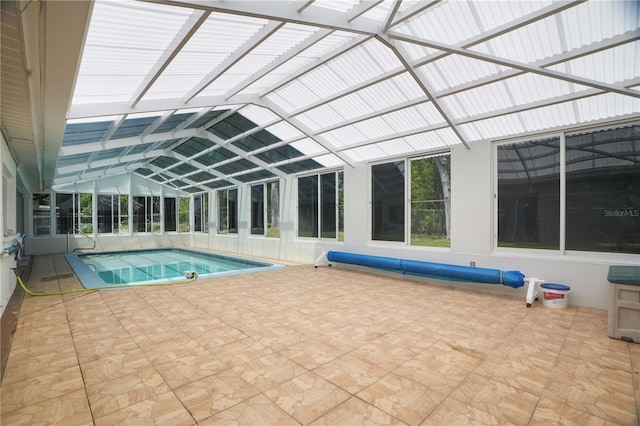 12106 Bear Creek Ln, Hudson, FL 34667 - indoor pool featuring a patio and a lanai