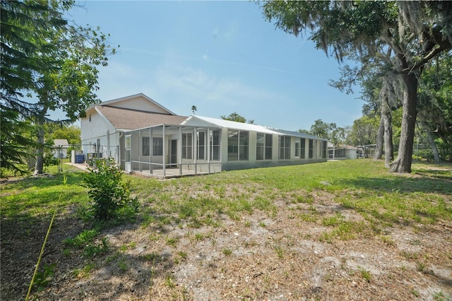 12106 Bear Creek Ln, Hudson, FL 34667 - back of property featuring a lanai
