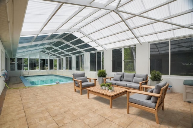 12106 Bear Creek Ln, Hudson, FL 34667 - indoor pool featuring an outdoor hangout area, a patio, and a lanai