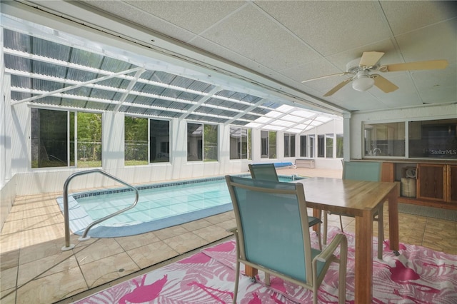 12106 Bear Creek Ln, Hudson, FL 34667 - indoor pool with a ceiling fan and a patio area