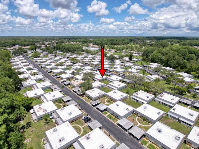 11821 Boynton Ln, New Port Richey, FL 34654 - aerial view of residential area featuring a heavily wooded area