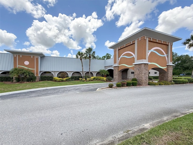 11821 Boynton Ln, New Port Richey, FL 34654 - view of asphalt road featuring curbs