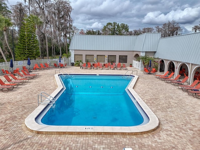 11821 Boynton Ln, New Port Richey, FL 34654 - community pool with a patio