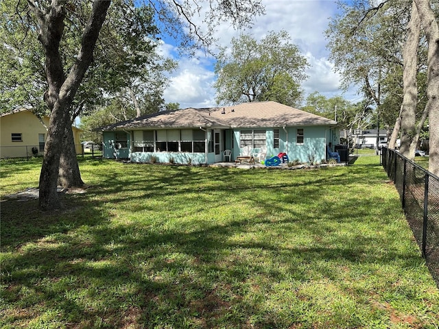 2158 Clayton Ave, Spring Hill, FL 34609 - rear view of property featuring a sunroom