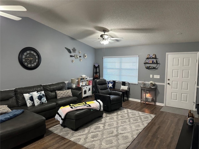 2158 Clayton Ave, Spring Hill, FL 34609 - living room with ceiling fan, dark wood-style flooring, a textured ceiling, and baseboards