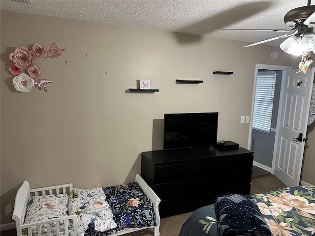 2158 Clayton Ave, Spring Hill, FL 34609 - bedroom with carpet, a textured ceiling, and ceiling fan