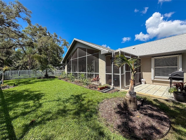 13627 Glaze Brook Dr, Hudson, FL 34667 - back of house with stucco siding, a patio area, and a sunroom