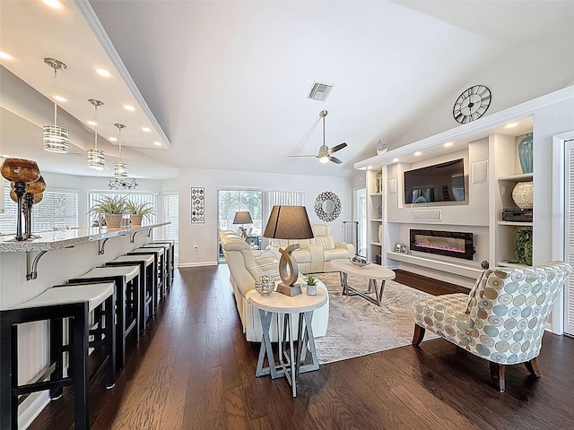 13627 Glaze Brook Dr, Hudson, FL 34667 - living room featuring ceiling fan, vaulted ceiling, dark wood-style floors, recessed lighting, and baseboards