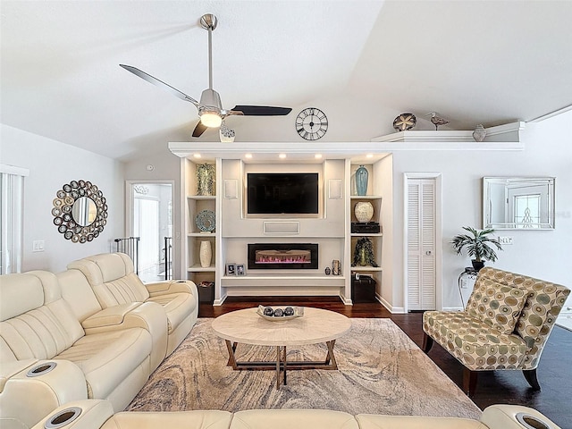 13627 Glaze Brook Dr, Hudson, FL 34667 - living room with vaulted ceiling, ceiling fan, and dark wood-style floors