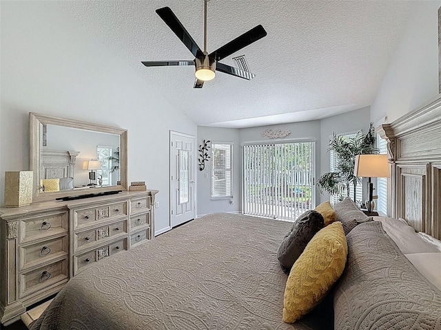 13627 Glaze Brook Dr, Hudson, FL 34667 - carpeted bedroom with a textured ceiling, vaulted ceiling, access to exterior, and a ceiling fan