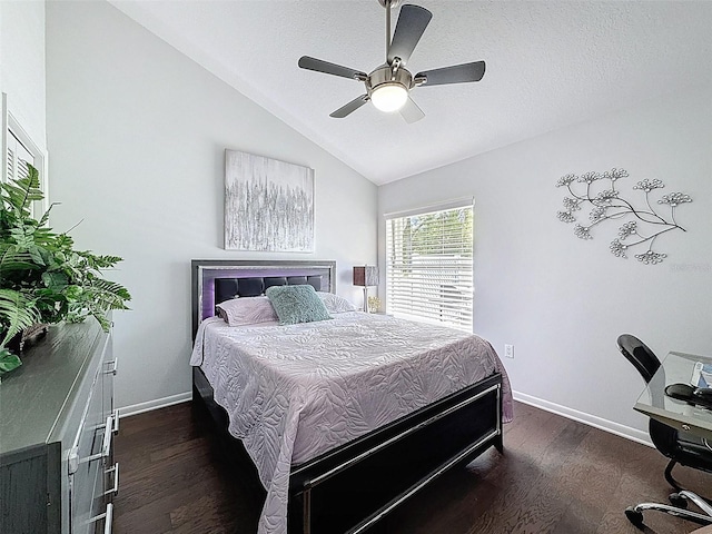 13627 Glaze Brook Dr, Hudson, FL 34667 - bedroom with lofted ceiling, dark wood finished floors, baseboards, a textured ceiling, and a ceiling fan