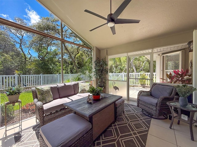13627 Glaze Brook Dr, Hudson, FL 34667 - sunroom with a ceiling fan, outdoor lounge area, high vaulted ceiling, and tile patterned flooring