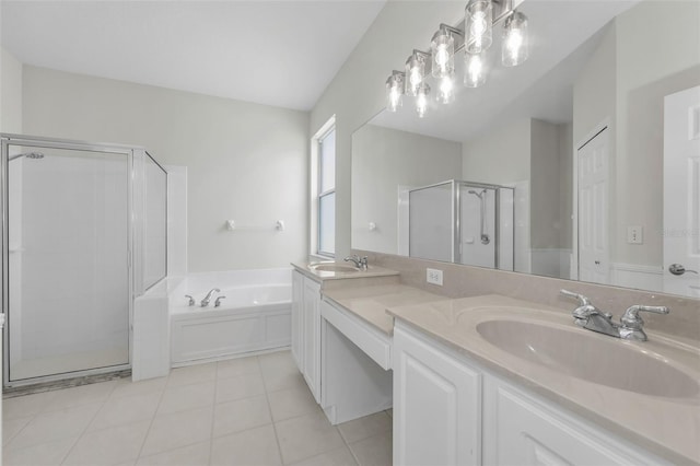 10344 Tecoma Dr, Trinity, FL 34655 - full bathroom featuring a bath, a stall shower, tile patterned floors, and double vanity