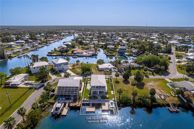 3546 Flamingo Blvd, Hernando Beach, FL 34607 - aerial perspective of suburban area with a nearby body of water