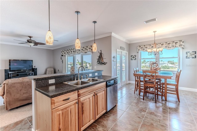3546 Flamingo Blvd, Hernando Beach, FL 34607 - kitchen with stainless steel dishwasher, a sink, crown molding, a kitchen island with sink, and a chandelier