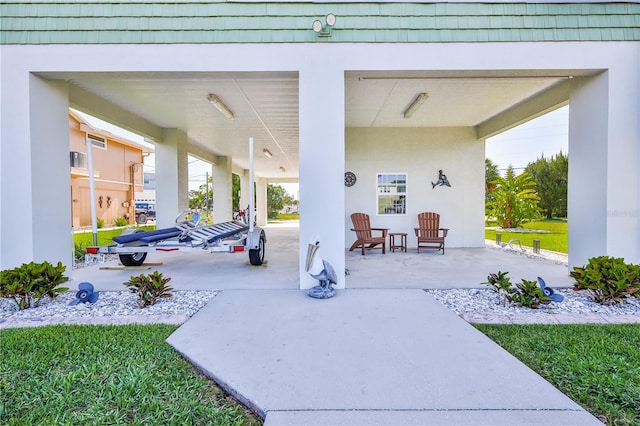 3546 Flamingo Blvd, Hernando Beach, FL 34607 - view of patio / terrace featuring a carport