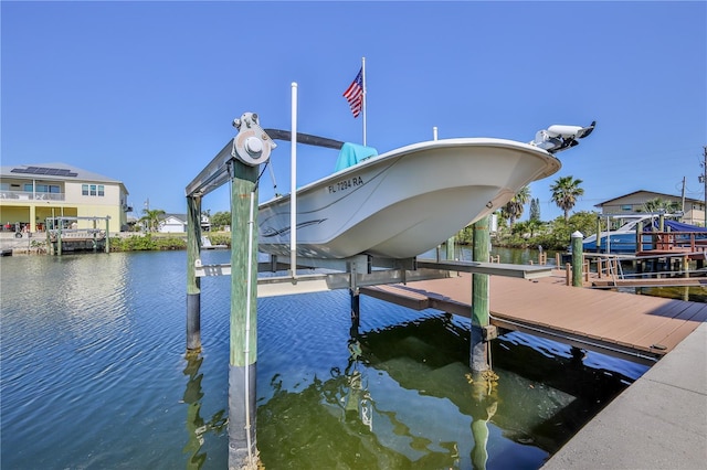 3546 Flamingo Blvd, Hernando Beach, FL 34607 - dock area with boat lift and a water view