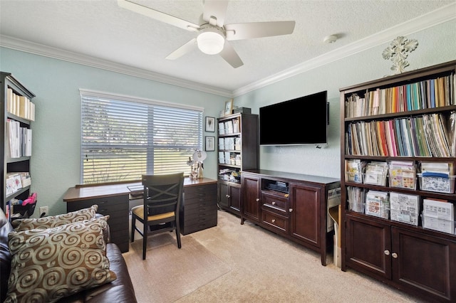 office with ornamental molding, ceiling fan, light carpet, and a textured ceiling