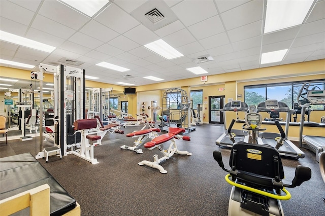 gym featuring a paneled ceiling