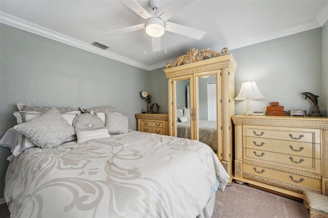 18520 Hidden Pines Way, Hudson, FL 34667 - bedroom featuring ornamental molding, carpet flooring, and a ceiling fan