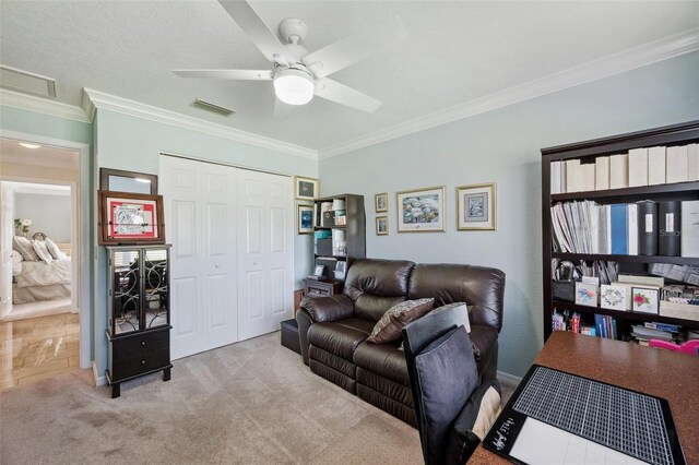 18520 Hidden Pines Way, Hudson, FL 34667 - carpeted living area featuring crown molding and ceiling fan