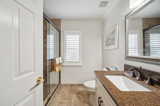 18520 Hidden Pines Way, Hudson, FL 34667 - full bath featuring plenty of natural light, toilet, vanity, and a stall shower