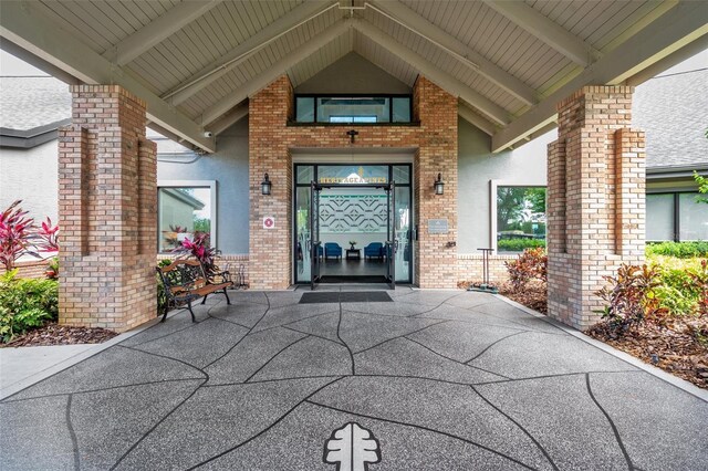18520 Hidden Pines Way, Hudson, FL 34667 - view of exterior entry with brick siding