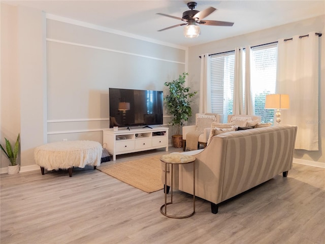 12408 Country White Cir, Tampa, FL 33635 - living room featuring ceiling fan, light wood-style floors, and baseboards