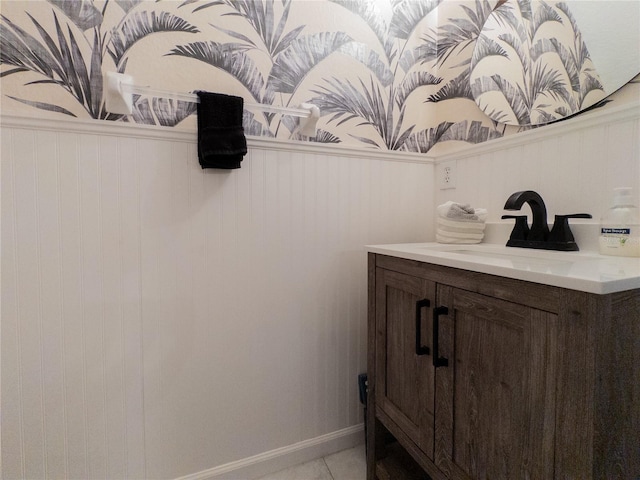 12408 Country White Cir, Tampa, FL 33635 - bathroom with vanity, wainscoting, and baseboards