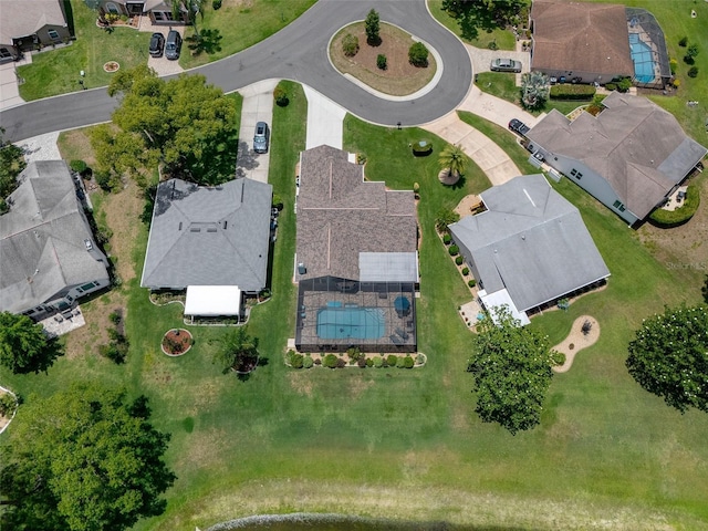 aerial view of residential area with a pool area