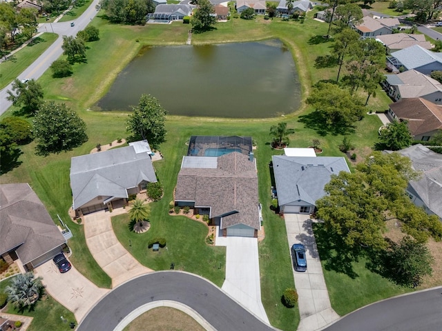 aerial overview of property's location with nearby suburban area and a nearby body of water
