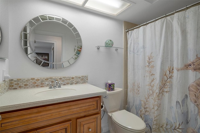 bathroom featuring tasteful backsplash, toilet, vanity, and a shower with shower curtain