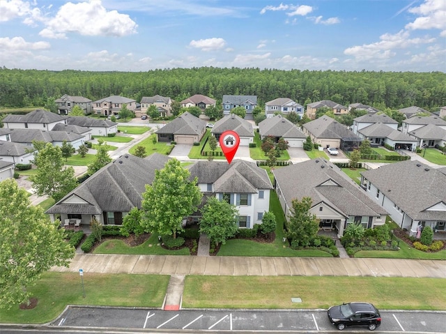 12854 Rangeland Blvd, Odessa, FL 33556 - aerial view of residential area with a heavily wooded area