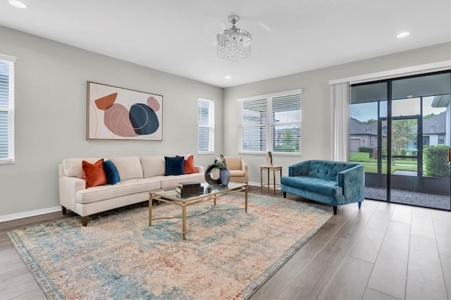 12854 Rangeland Blvd, Odessa, FL 33556 - living room with plenty of natural light, wood finished floors, baseboards, and recessed lighting
