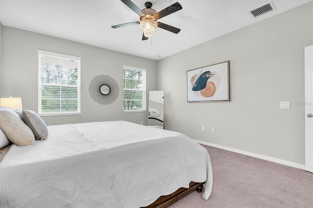 12854 Rangeland Blvd, Odessa, FL 33556 - bedroom with carpet floors, baseboards, and ceiling fan