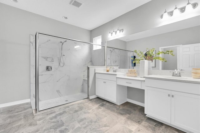12854 Rangeland Blvd, Odessa, FL 33556 - full bathroom with a marble finish shower, two vanities, and baseboards