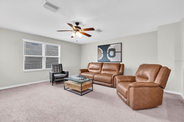 12854 Rangeland Blvd, Odessa, FL 33556 - carpeted living room featuring ceiling fan and baseboards