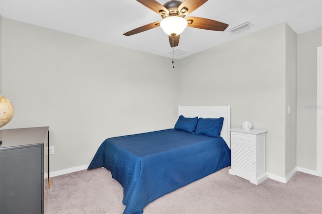 12854 Rangeland Blvd, Odessa, FL 33556 - bedroom featuring light carpet, baseboards, and ceiling fan