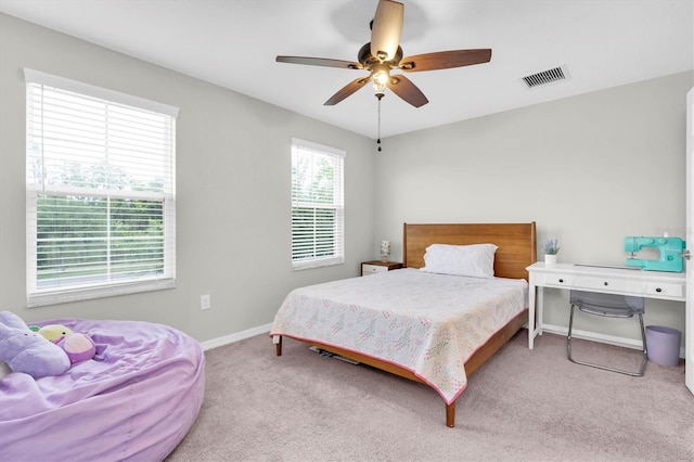 12854 Rangeland Blvd, Odessa, FL 33556 - carpeted bedroom with baseboards and a ceiling fan