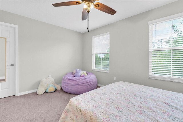 12854 Rangeland Blvd, Odessa, FL 33556 - bedroom featuring carpet floors, baseboards, and a ceiling fan