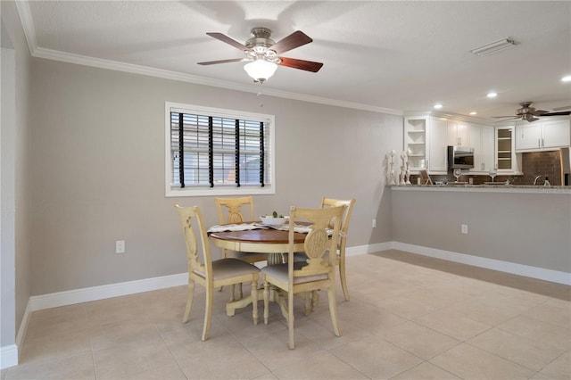5045 Pelican Dr, New Port Richey, FL 34652 - dining area featuring ceiling fan, ornamental molding, light tile patterned floors, baseboards, and recessed lighting