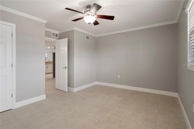 5045 Pelican Dr, New Port Richey, FL 34652 - unfurnished bedroom with crown molding, baseboards, light tile patterned floors, and a ceiling fan